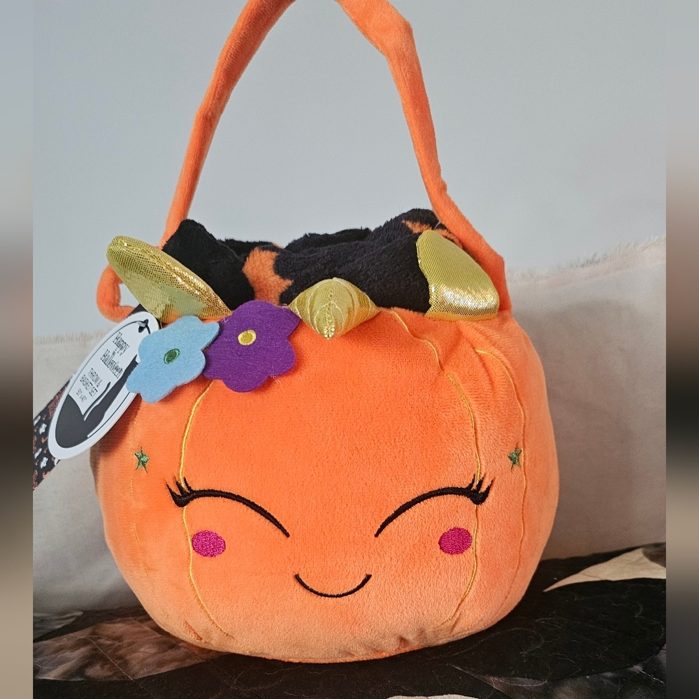 Halloween Unicorn Pumpkin Basket stuffed w/a 50x40 blanket.